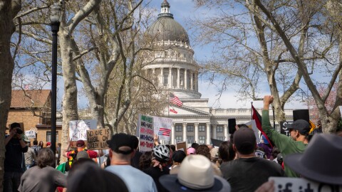 The protest march against President Donald Trump’s administration approaches the Utah State Capitol in Salt Lake City, March 28, 2026.