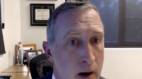 man in suit in an office