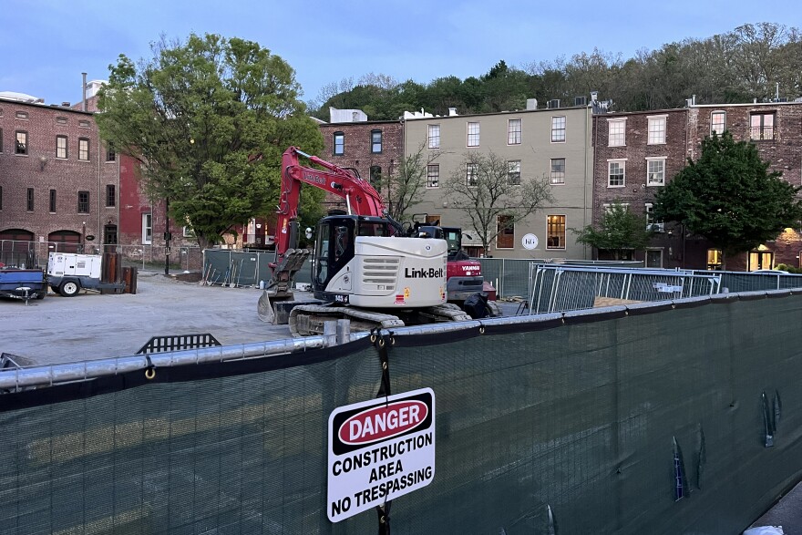 The Wharf parking lot is currently under construction to repair the creek tunnel that runs under Byers Street. The plans do not include daylighting the tunnels.