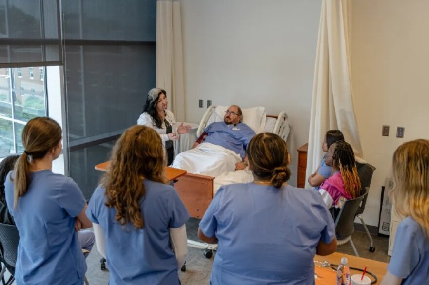 Students learn how to measure blood pressure during a nurse aide class at Blue Ridge Community College in Hendersonville in June. The college, which serves students in Henderson and surrounding Western North Carolina counties, plans to submit the course for Workforce Pell eligibility.
