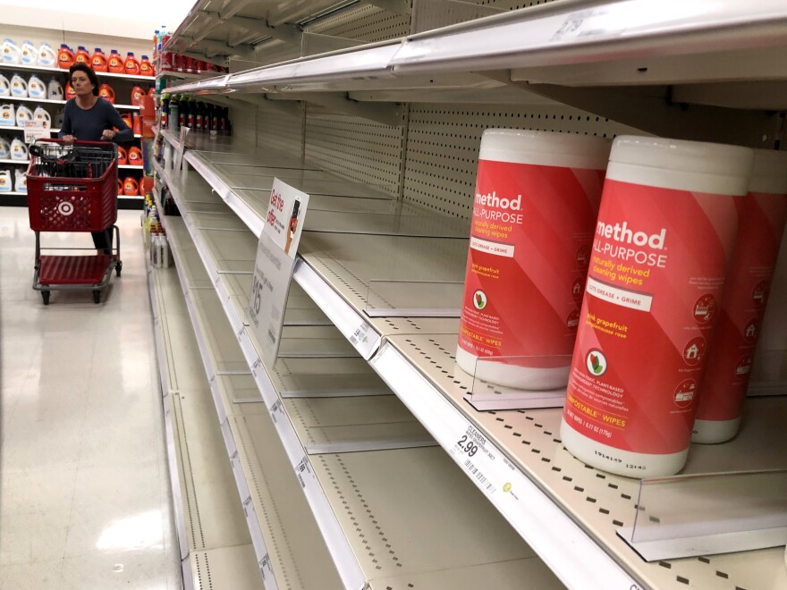 Fears of the virus have prompted shoppers to stock up on sanitizing options, leaving shelves of disinfectant wipes nearly empty at a Target store in Novato, Calif.