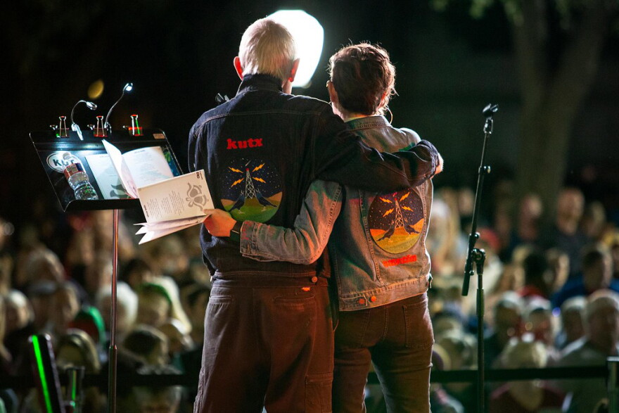 John Aielli and Elizabeth McQueen sings carols with the crowd at the 2018 KUT and KUTX Holiday Sing-Along