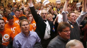 Supporters cheer in Colorado Springs, Colo., as a television broadcast declares that Republicans have taken control of the Senate. Republican candidates, party committees and outside groups spent about $44 million more than Democrats, according to the Center for Responsive Politics.