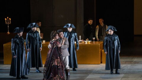 A scene from the NCPA's production of Puccini's Tosca. Embracing are soprano Monica Zanettin (Tosca) and tenor Han Peng (Cavaradossi).