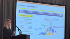 Heidi Hertz, Director of Virginia’s Rural Health Transformation Fund, shows current federally designated "rural" area maps at the Claude Moore Scholars & Regional Healthcare Workforce Meeting Friday morning.