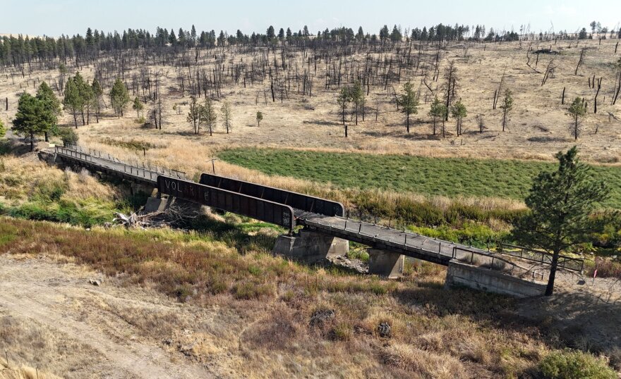 Cyclists cross a century-old trestle near Rosalia on the John Wayne Trail, now the Palouse to Cascades State Park Trail, which runs 253 miles across Washington.