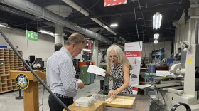 Katherine Saint, president of Bridgeport manufacturing company Schwerdtle, takes Gov. Ned Lamont on a tour of the factory floor. Lamont announced today a new low-interest loan program for small businesses and nonprofits called Connecticut Small Business Boost Fund.