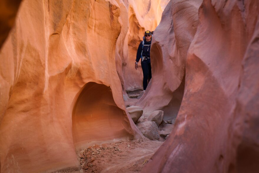 Hikers make their way through Dry Fork Narrows in Grand Staircase-Escalante National Monument, March 10, 2025.