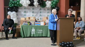 Project Flight cofounders and Buffalo State University professors Geraldine Bard, in blue jacket, and Elizabeth Cappella, in black jacket, describe the importance of literacy in Buffalo.
