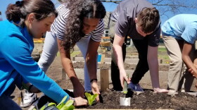 Katharine Bowers, left, was named 2024 Teacher of the Year by the Rhode Island Environmental Association. She helped establish a composting and food waste reduction program at the middle school where she teaches.