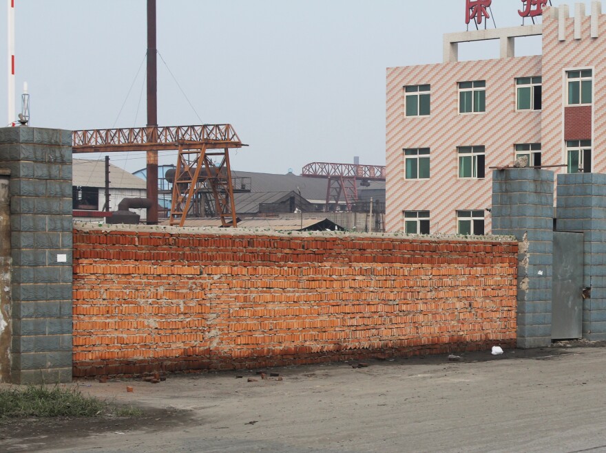 China faces overcapacity in various industries, including steel. This steel mill in the northern city of Tangshan went bankrupt in August after it expanded too quickly and the boss ending up owing banks more than $120 million. Authorities sealed the front gate with bricks.