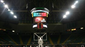 Players warm up for a COVID-friendly game at Wright State's Ervin J. Nutter Center in Dayton