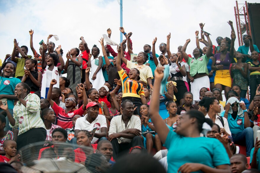Thousands of Haitians dance and cheer as the finalists sing their songs of child slavery at Port-au-Prince's soccer stadium on Aug. 23.