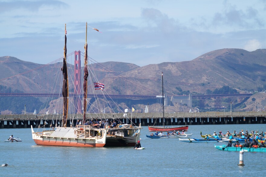 Once the canoe was moored, the outrigger canoes formed a circle around Hōkūleʻa for a moment of reflection for Maui.