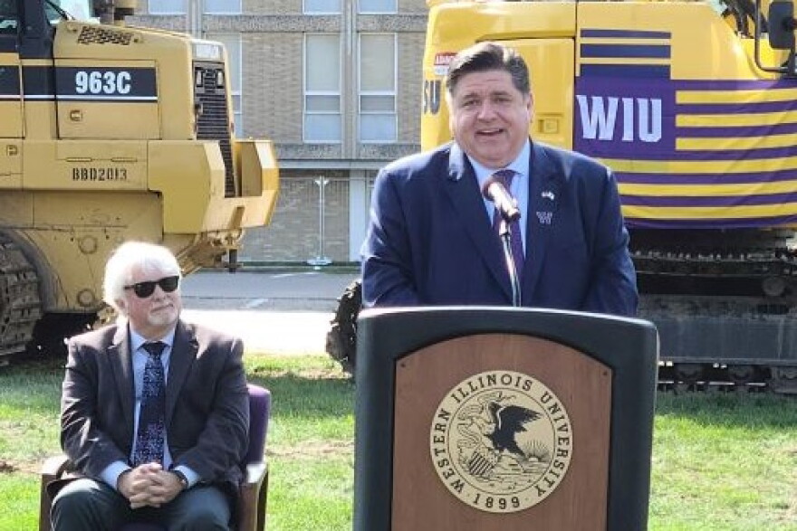 Billy Clow looks on while Gov. JB Pritzker addresses the crowd during the groundbreaking ceremony in Oct. 2022.