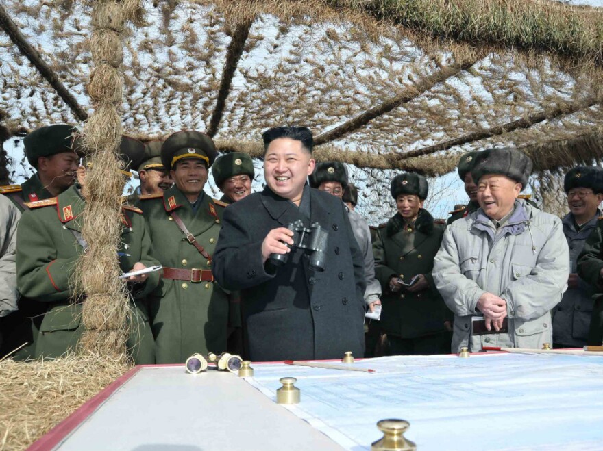 North Korean leader Kim Jong Un (center) inspects army units at an undisclosed location in this photo released by the Korean Central News Agency on Monday. 