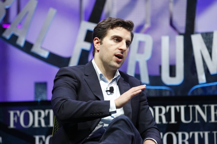 Airbnb co-founder and CEO Brian Chesky speaks during the Fortune Global Forum - Day 3 at the Fairmont Hotel on Nov. 4, 2015 in San Francisco, Calif.  In response to President Trump's travel ban, Airbnb "is now providing free housing to refugees and anyone recently barred from entering the US," according to a statement from Chesky. (Kimberly White/Getty Images for Fortune)