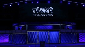 A screen displays a video clip about Republican presidential candidate Donald Trump on the first day of the Democratic National Convention at the Wells Fargo Center, July 25, 2016 in Philadelphia, Pennsylvania. (Alex Wong/Getty Images)
