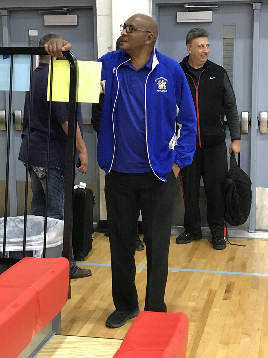 Argie Rhymes is a product of the inner-city Phoenix Union High School, first as a star player in the '60s, then as basketball coach at his alma mater.