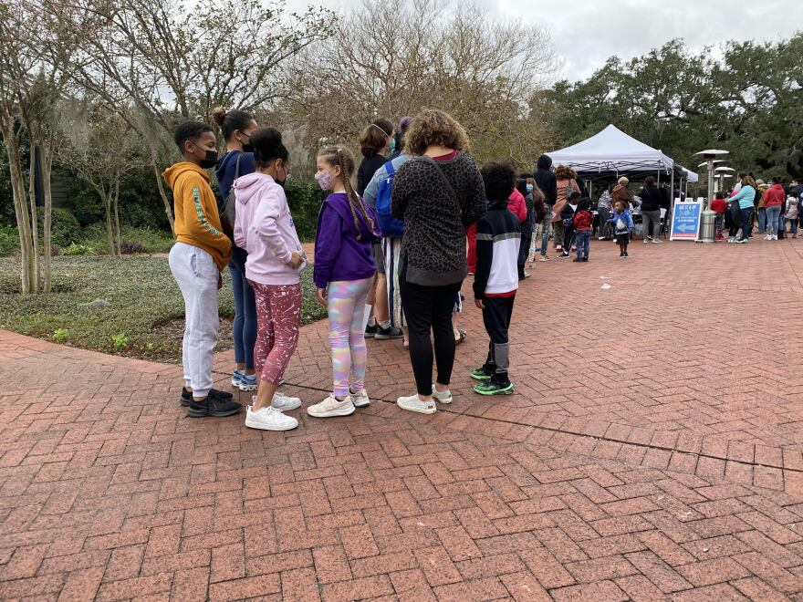  Hundreds of children and their parents lined up for a COVID-19 shot at a Louisiana Department of Health vaccine clinic in New Orleans.