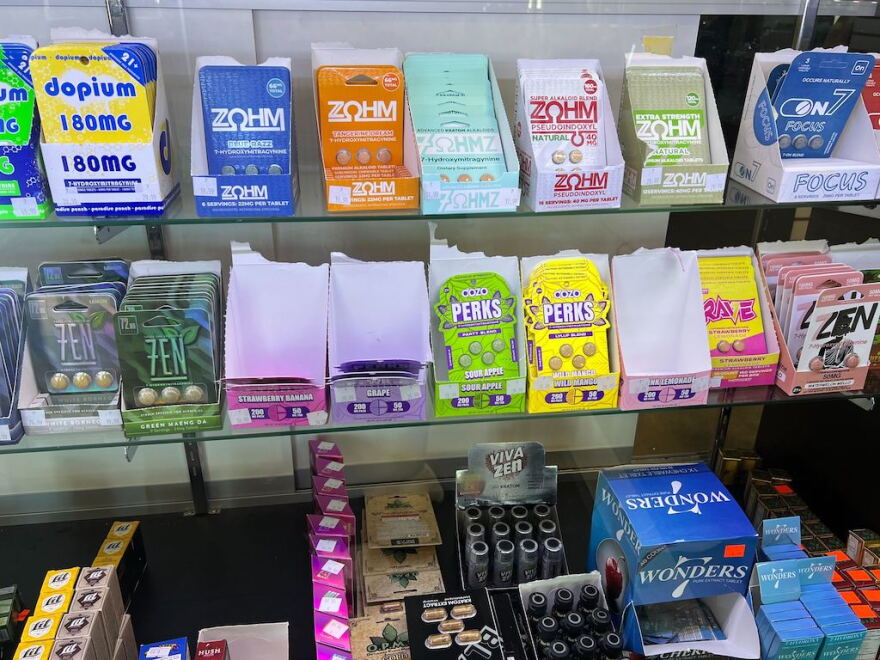 A variety of kratom and 7-OH products — including capsules, cartridges and wellness shots — are on display at a smoke shop in Buffalo, N.Y. States have led the way in regulating kratom, and now federal officials want to ban 7-OH, a powerful compound found in some kratom products.