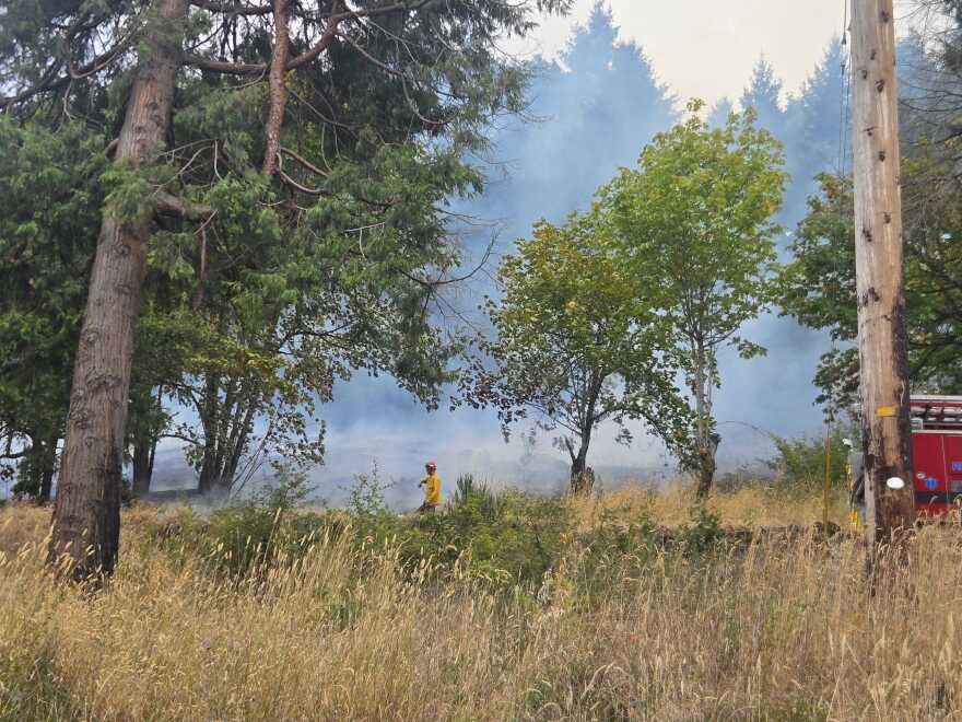 Fire crews fighting fire on Skinner Butte 