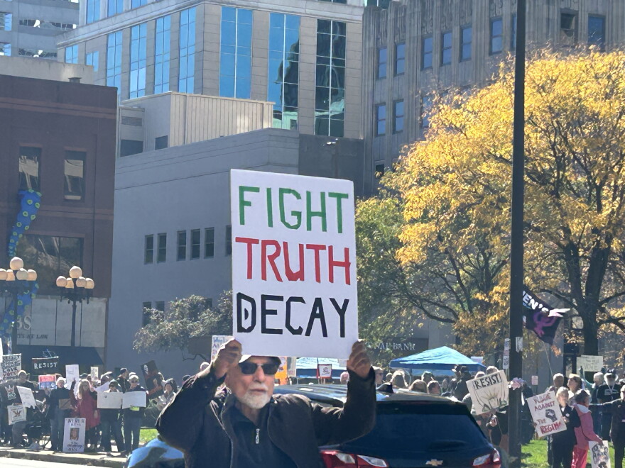 A protestor expresses his views at No Kings: Vote Early on Saturday, October 17, 2026.