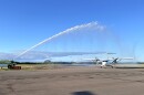 During Lānaʻi Air's first landing of their scheduled service to Moloka'i on Wednesday, the fire department welcomed the plane with a water salute as it taxied off the runway.