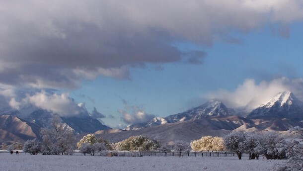 Mount Timpanogos is seen in the clouds.