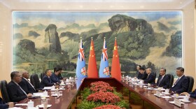 Fiji's Prime Minister Sitiveni Rabuka, second left and Chinese President Xi Jinping, right, attend a meeting at the Great Hall of the People in Beijing, China, Tuesday, Aug.20, 2024. (Andres Martinez Casares/Pool Photo via AP)