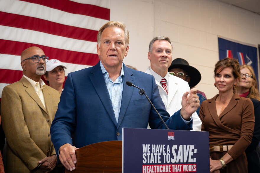 Michigan U.S. Senate candidate Mike Rogers speaks to reporters at a campaign office in Taylor, Michigan on Saturday, September 19.