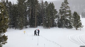 NRCS hydrologists David Eriksson and Joel Burley gathering a snow sample near Spirt Lake in the northeastern Uintas.