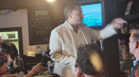 Republican City Council member Tariq Bokhari spoke Tuesday night during a Republican party at Selwyn Pub in Myers Park.