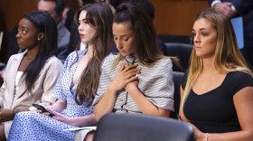 FILE - United States gymnasts from left, Simone Biles, McKayla Maroney, Aly Raisman and Maggie Nichols, arrive to testify during a Senate Judiciary hearing about the Inspector General's report on the FBI's handling of the Larry Nassar investigation on Capitol Hill, Wednesday, Sept. 15, 2021, in Washington.