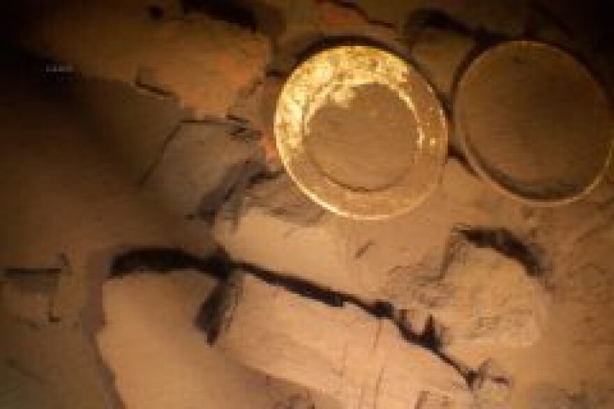 Dinner plates and iron ore are among the debris left behind with the wrecked ship called Nucleus. Photo courtesy of the Great Lakes Shipwreck Historical Society.