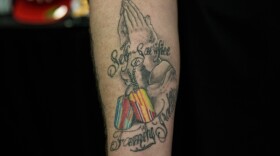 Lewis Hunt's tattoo commemorates his grandfather, his parents, and his own military service.