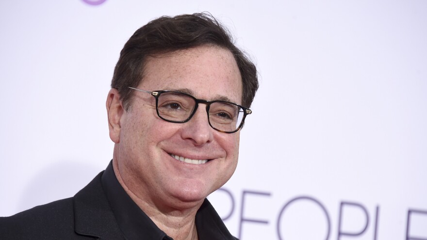 Bob Saget arrives at the People's Choice Awards at the Microsoft Theater on Jan. 18, 2017, in Los Angeles.