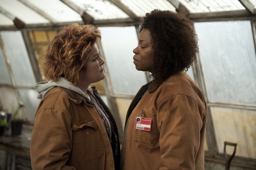 Kate Mulgrew and Lorraine Toussaint in a scene from Netflix's <em>Orange is the New Black.</em>