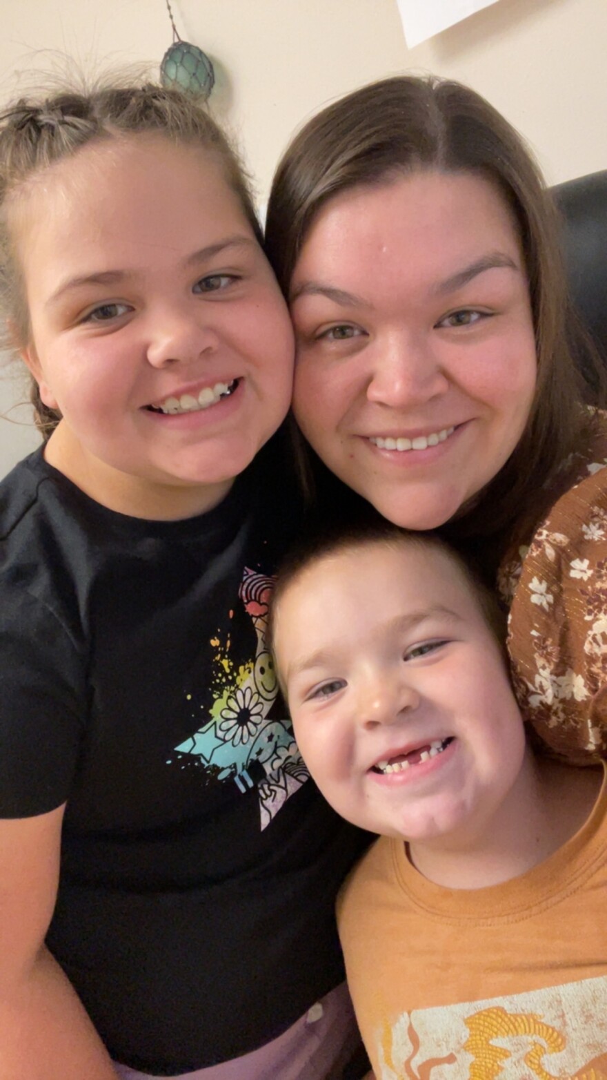 Freddie Bragg, candidate for the Bristol Bay Borough School Board, and her children Ronda and Lincoln.