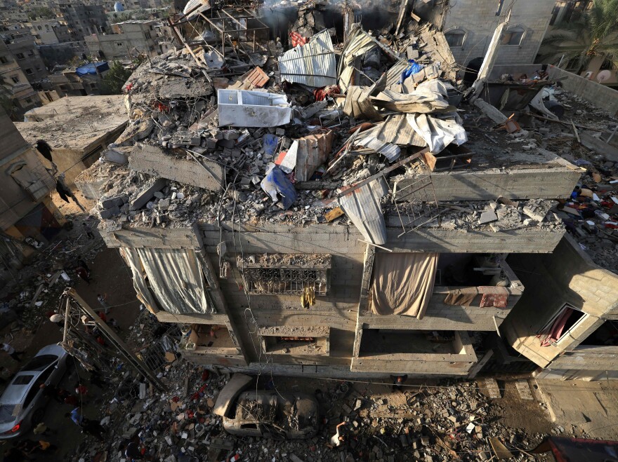 An overview of a destroyed building following Israeli bombardment of Khan Younis overnight into Friday.