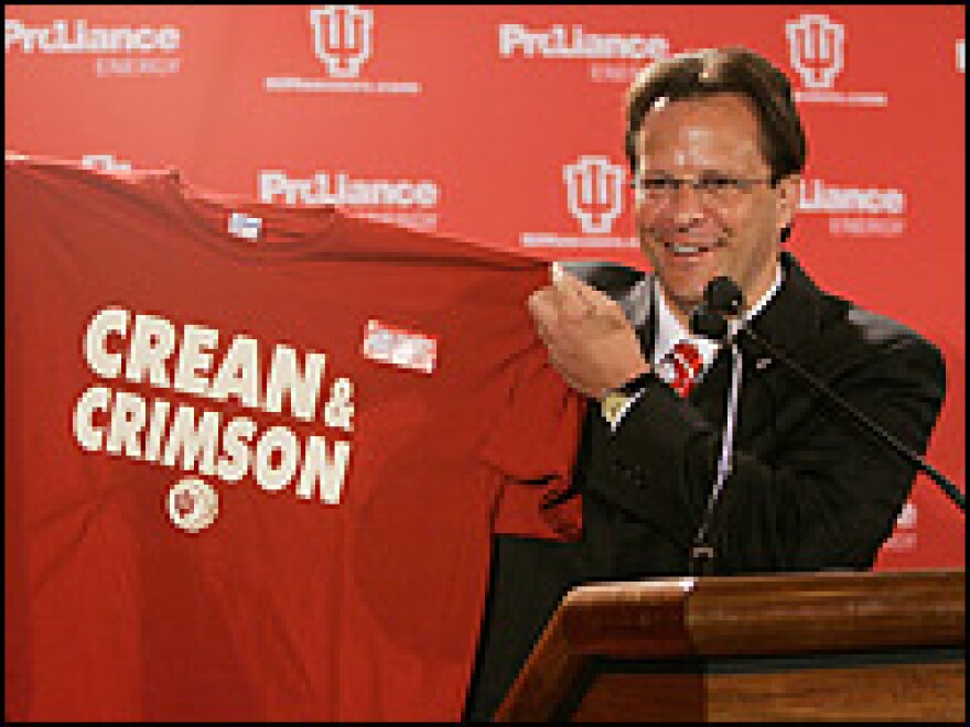 Tom Crean holds up a shirt after being introduced as the new Indiana Hoosiers basketball head coach in Bloomington, Ind., in April.