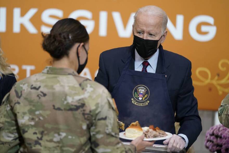 President Joe Biden serves dinner during a visit to soldiers at Fort Bragg ahead of Thanksgiving 2021. (Evan Vucci/AP)