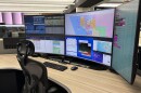 At the new Lee Public Safety Center, emergency telecommunicators, like 911 operators, are given a workstation with five computer monitors and an elevating desk. (Emma Rodriguez/WGCU) 