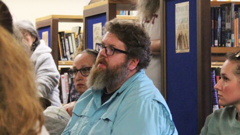 Blake Sawyer asks school district representatives questions during a community meeting at Nikolaevsk School on Thursday, Apr. 3, 2025 in Nikolaevsk, Alaska.
