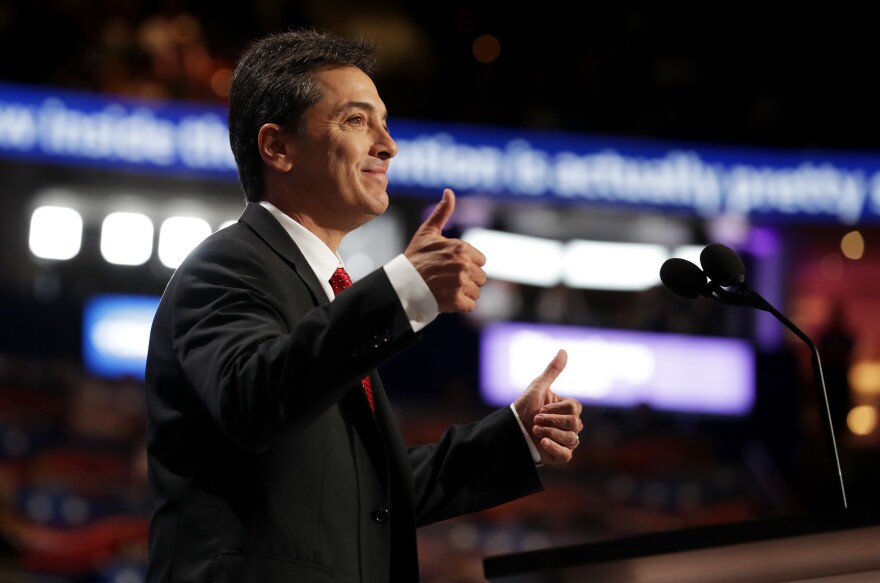 Scott Baio gives two thumbs up during his speech on the first day of the Republican National Convention on Monday at the Quicken Loans Arena in Cleveland.
