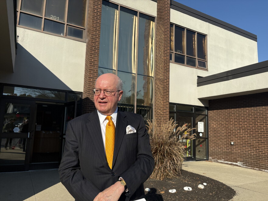 Clifton Park town attorney Kevin Dailey standing in front of town hall