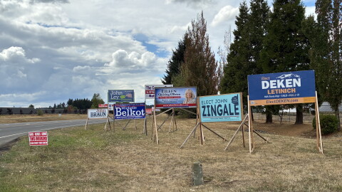 Election signs on the side of a highway entering the city of Battle Ground, WA.