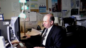 Buffalo News reporter Brian Meyer at his City Hall office desk