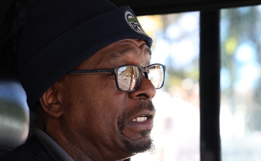 RTS Bus Driver Edward Hines talks to passengers while driving the roads that make up route 76 in Gainesville, Fla. on Thursday, Nov. 13, 2025.