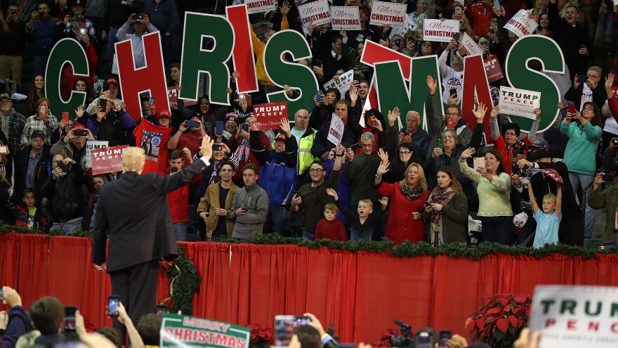 President Trump walks onstage, as he holds a rally in Pensacola, Fla., earlier this month, where he endorsed Alabama Republican candidate Roy Moore. Moore lost Tuesday to Democrat Doug Jones.